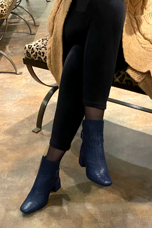 Navy blue women's ankle boots with buckles at the back. Square toe. Medium block heels. Worn view - Florence KOOIJMAN